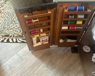 #116 - $280 - Black sewing cabinet with sewing machine