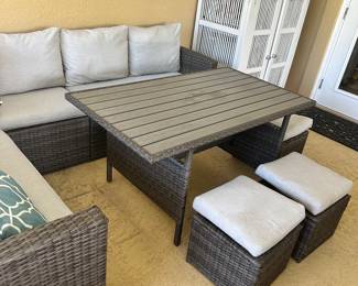 #90 - $700 - All weather wicker grey sofa lounging 70Wx24Dxc 86W with table 52Wx30Dx26H- 3 stools