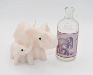 elephant shaped candle and small bottle