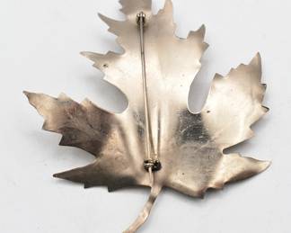 silver tone maple leaf brooch