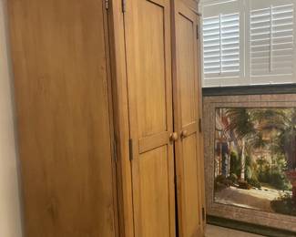 Tall wood cabinet $150