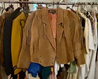 We have a room full of vintage to antique clothing already…and we haven’t even unpacked all the clothing boxes yet. And purses—boots—belts—shoes—sunglasses!