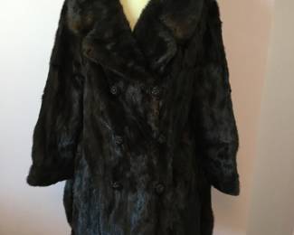 Fur coat with exquisite detailing and lining.