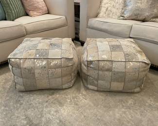 Clipped cowhide ottomans in checkerboard pattern, excellent condition
