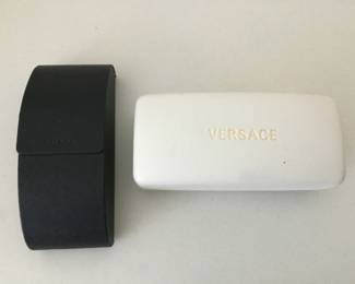 Prada and Versace empty sunglasses cases