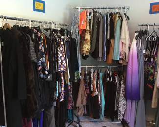 Tons of women’s clothing, many new with tags, designer pieces. Size small to plus size