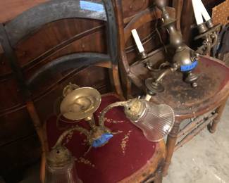 light fixtures and antique chairs