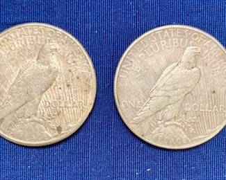 1928 "Peace" Silver Dollar. 1935 "Peace" Silver Dollar.