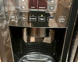 Black Side x Side GE Refrigerator/Freezer w/ In Door Water/Ice.