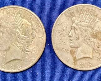 1928 "Peace" Silver Dollar. 1935 "Peace" Silver Dollar.