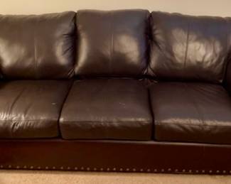 Burgundy Leather Nailhead Sofa.