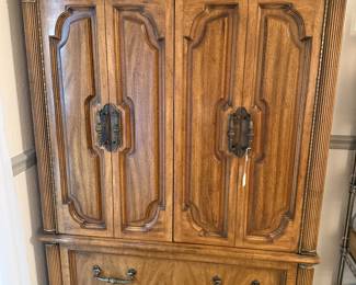 Nice piece. Doors open to drawers inside