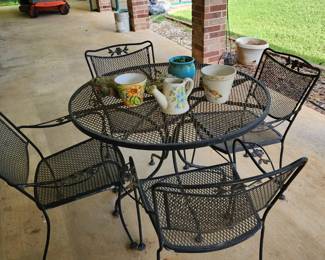 wrought iron table and chairs