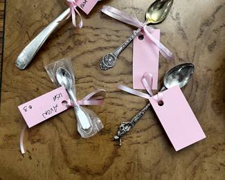 Variety of collectible and Silver Plate Spoons.