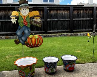 Beautiful pots and Yard Art.