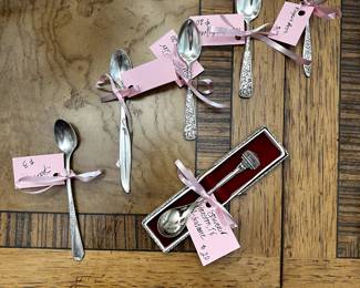 Variety of collectible and Silver Plate Spoons.