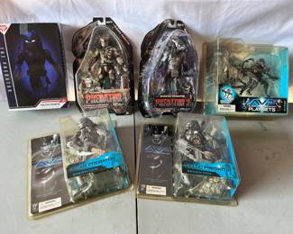 Alien / Predator Action Figures in their packaging.