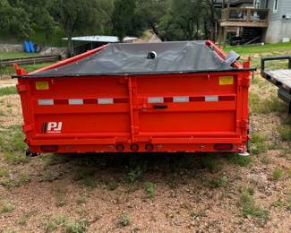 PJ dump trailer 1 yr old.