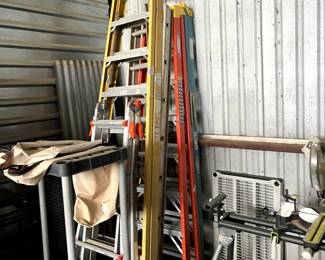 several extension ladders