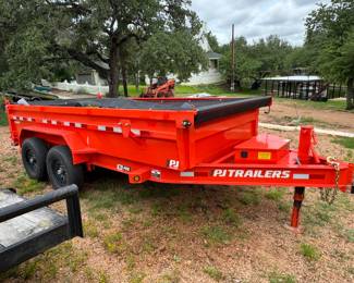 PJ dump trailer 1 yr old.
