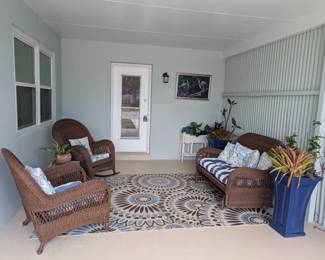 Tommy Bahama Patio Furniture and new outdoor rug.  Plant in Blue pot NOT AVAILABLE.