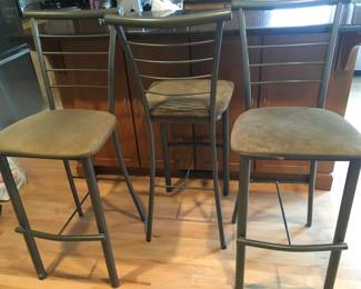 THREE IRON AND MICROFIBER COUNTER STOOLS
