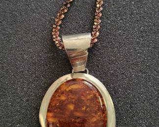 Giant Jay King amber cabochon amber.