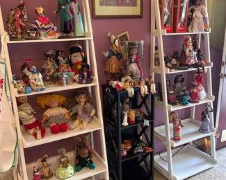 Ethnic dolls, white ladder shelves