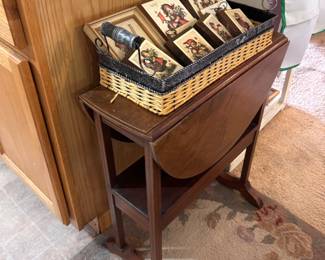 Small vintage table, baskets, art