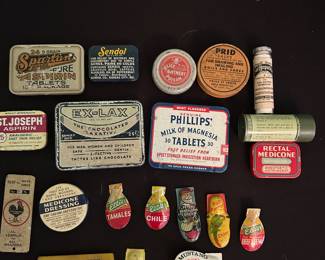 Vintage tins and clicker to go with typesetter