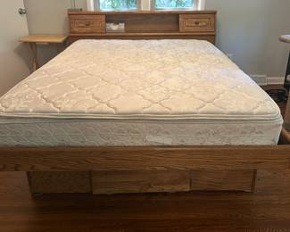 Oak floating bed with storage