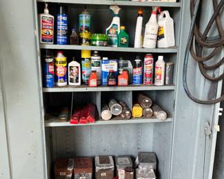 STEEL STORAGE CABINETS FULL OF WELDING STICKS, CLEANER, CAR REPAIR MANUALS