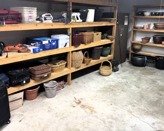Variety of planters, baskets and garage items.