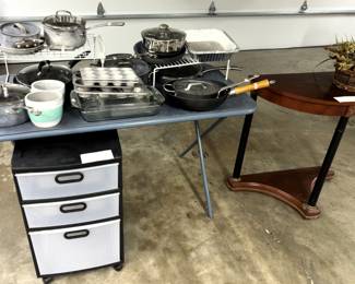Variety of pots and pans, demi lune table, three drawer cabinet.