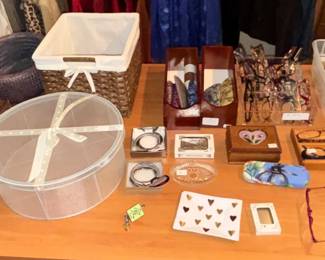 Variety of reading glasses and baskets.