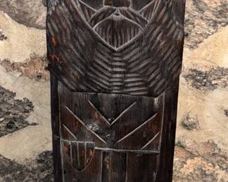Dark wood carving.