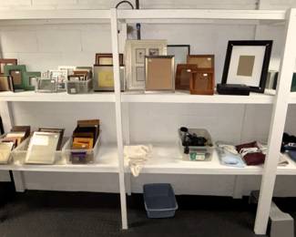 Variety of picture frames and decor.