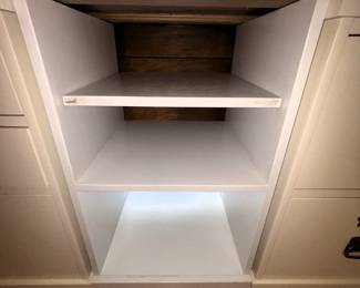 Two piece shelving tower, Base: 18" W x 28" H x 17" D. Top: 18" D x 60" W.