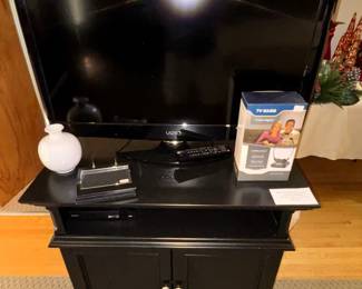 Vizio 37" smart TV. Black cabinet.