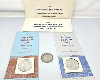 Lot #193 - Uncirculated 1884 & 1885 U.S. Silver Dollar Coins w/ Mint Paperwork, Plus a Circulated 1882 Silver Dollar