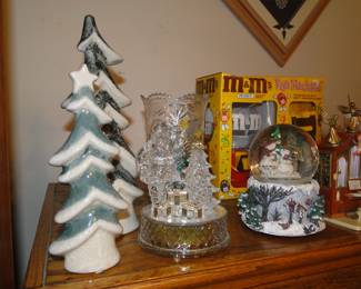 A very nice collection of snow globes, and music boxes too
