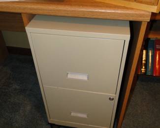 Two drawer file cabinet, complete with wheels