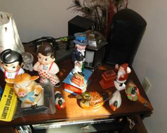 Cast iron banks, Big Boy banks, and a cow bank too