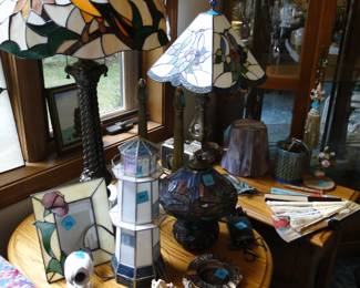 Stained glass lamps, phots frames, and other antique stained glass pieces