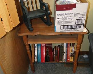 Free books, and the bookshelf, and rocking chair are also for sale too