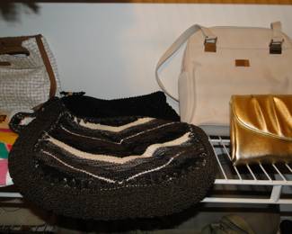 Beaded purses, leather purses, and brushed gold purses too