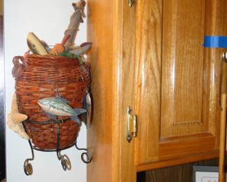 3D wall art of a basket, and other nautical items