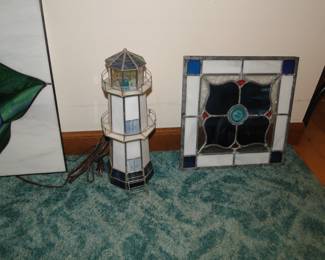 Stained glass lighthouse and another heavy stained glass piece