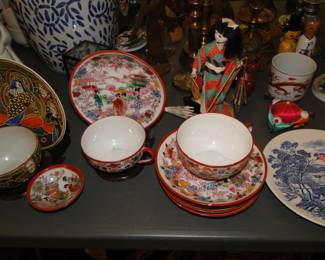 Asian inspired dolls, cups, plates, and bowls too