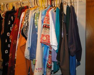 Women's clothing, suits, pants, shirts, and sweaters